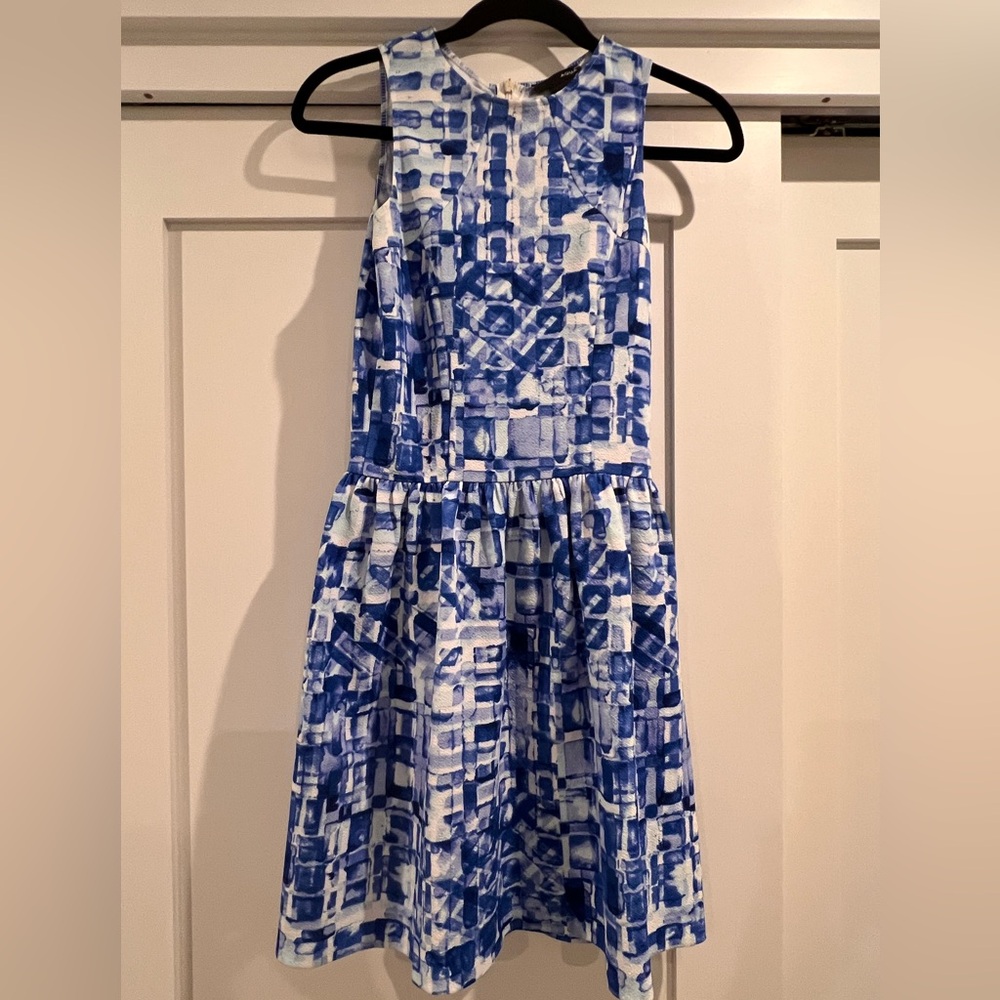 Aqua size small blue and white patterned dress for summer.  Knee length